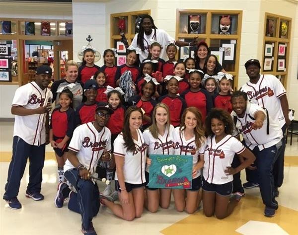 Students pose with Atlanta Braves ambassadors
